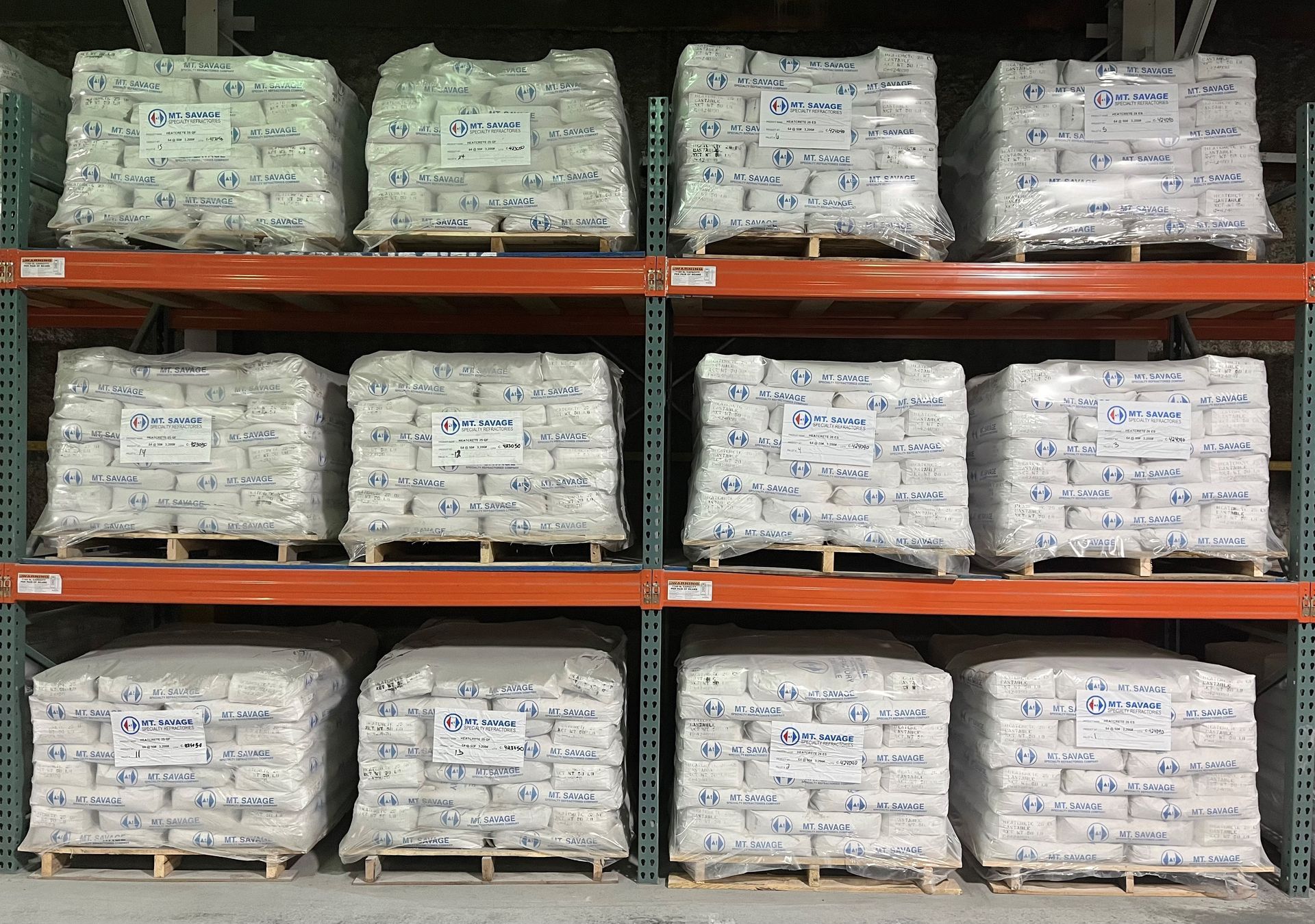 A warehouse filled with lots of bags and pallets