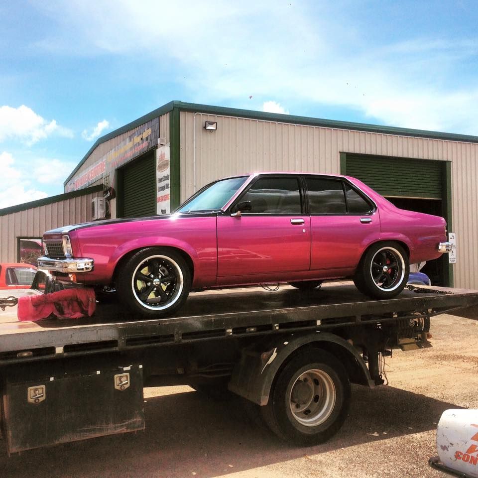 Pink Classic Car on a Flatbed Tow Truck — Banjo's Anytime Towing in Humpty Doo, NT