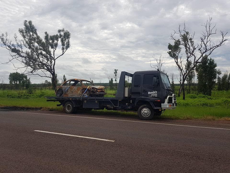 Emergency Towing of Car on A Cloudy Day