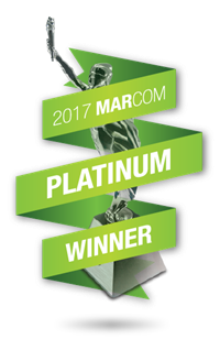 A picture of a trophy that says 2017 marcom platinum winner