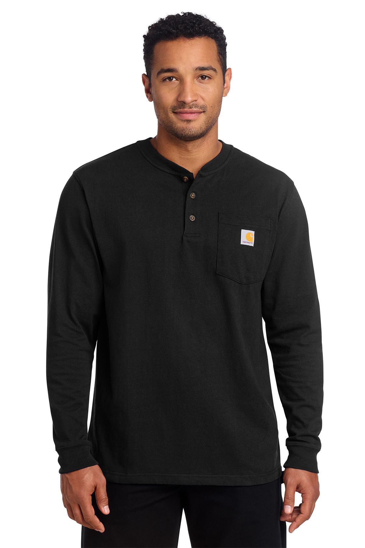 Man wearing a black long-sleeved Henley shirt with a chest pocket, smiling.