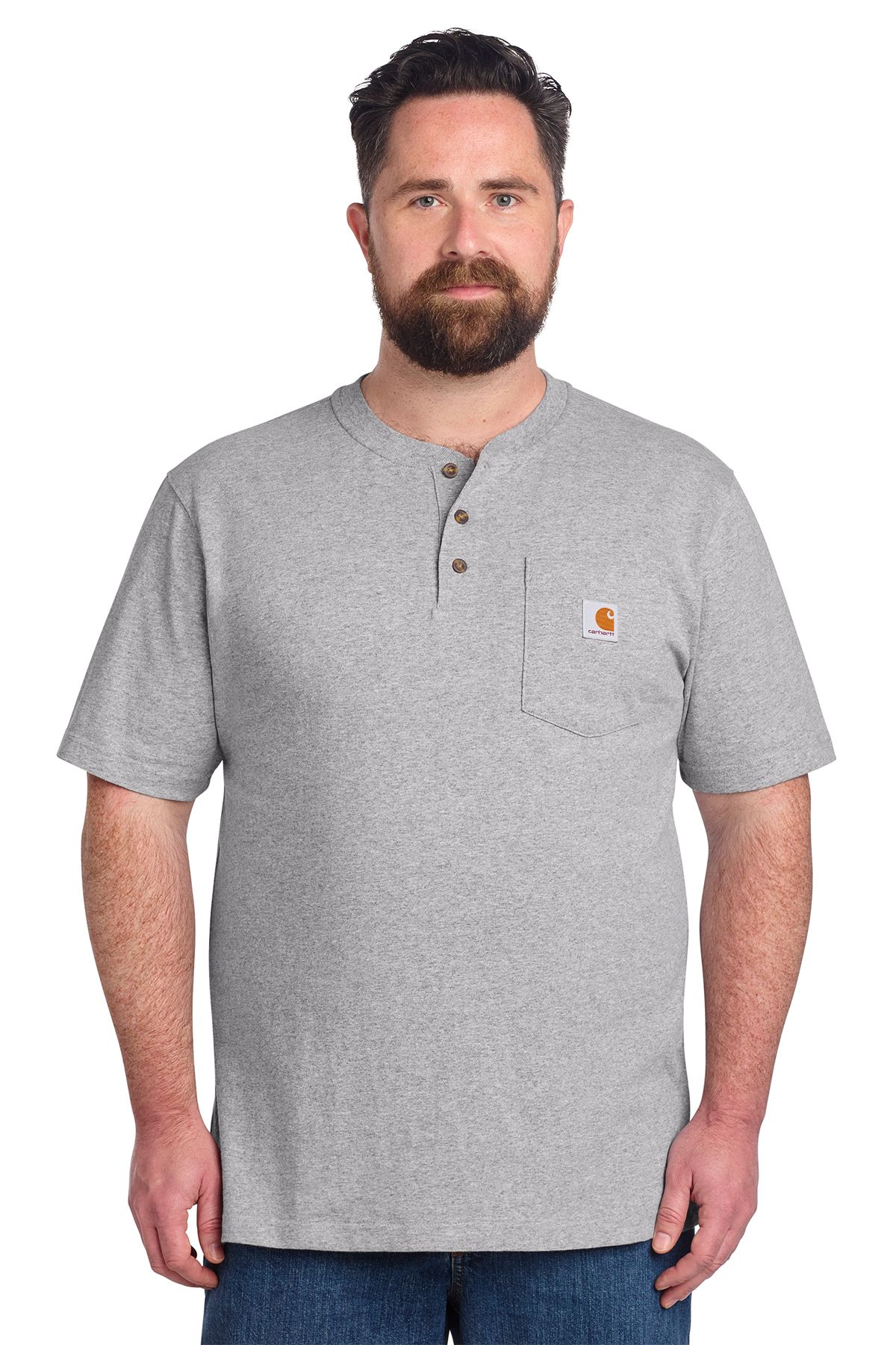 Man wearing a dark blue henley t-shirt with a chest pocket, jeans.