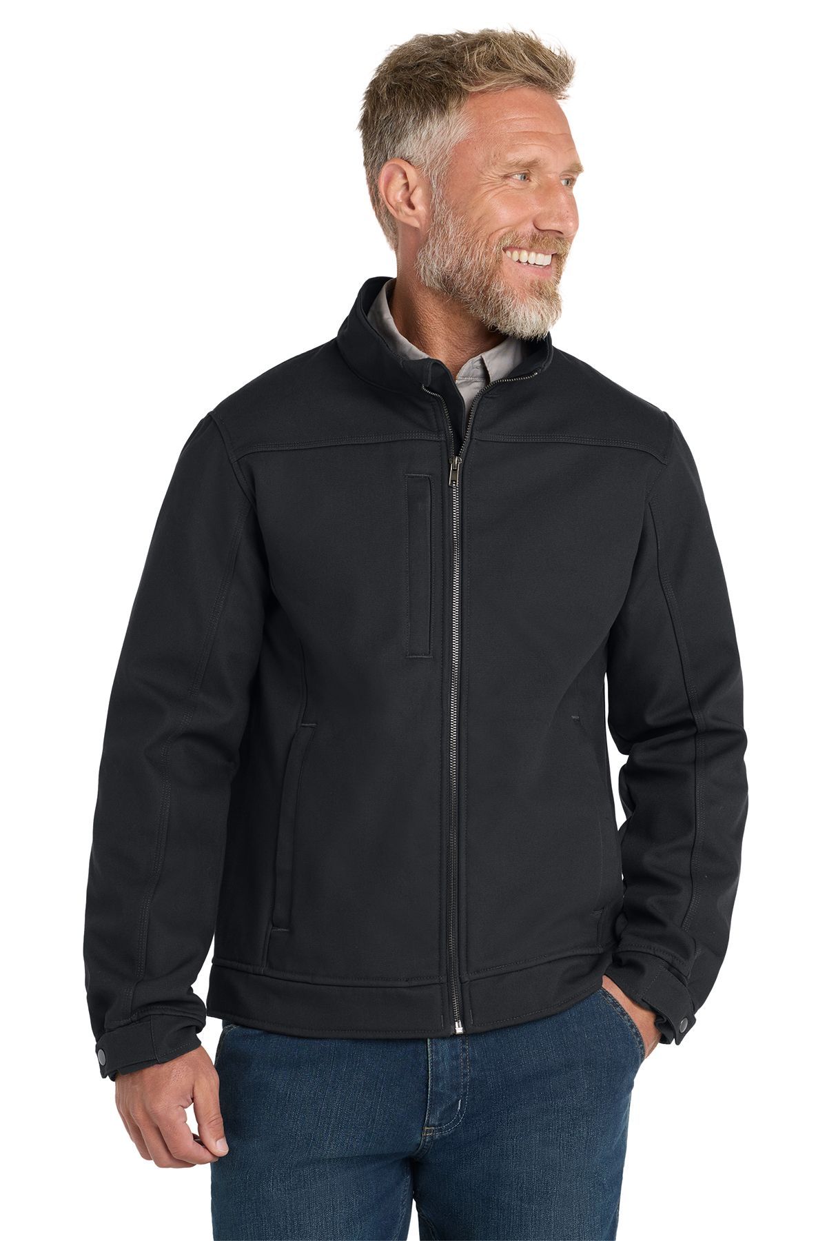 Man in black jacket, zipper closed, looking to his right, wearing blue jeans.