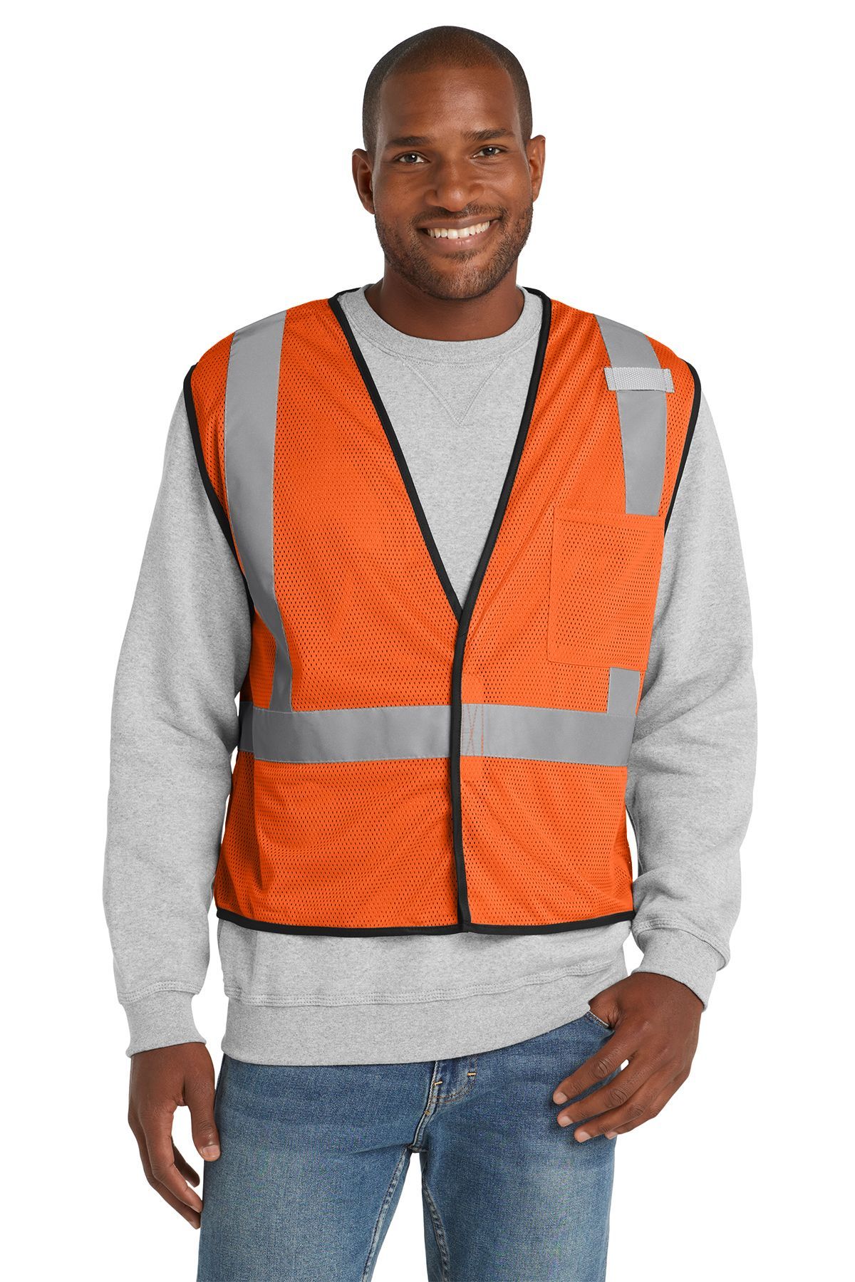 Person wearing a yellow safety vest with reflective stripes, smiling.