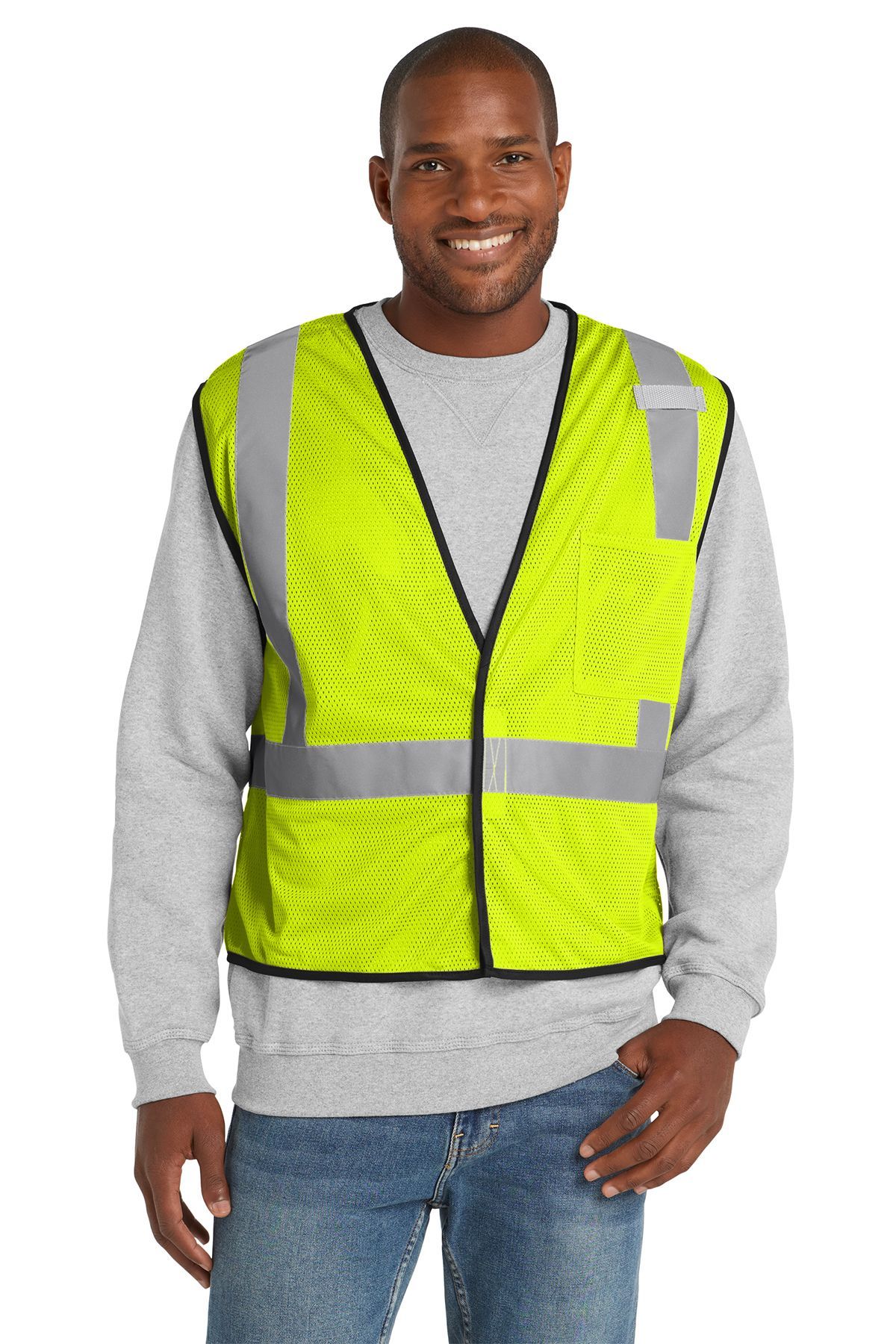 Person wearing a yellow safety vest with reflective stripes, smiling.