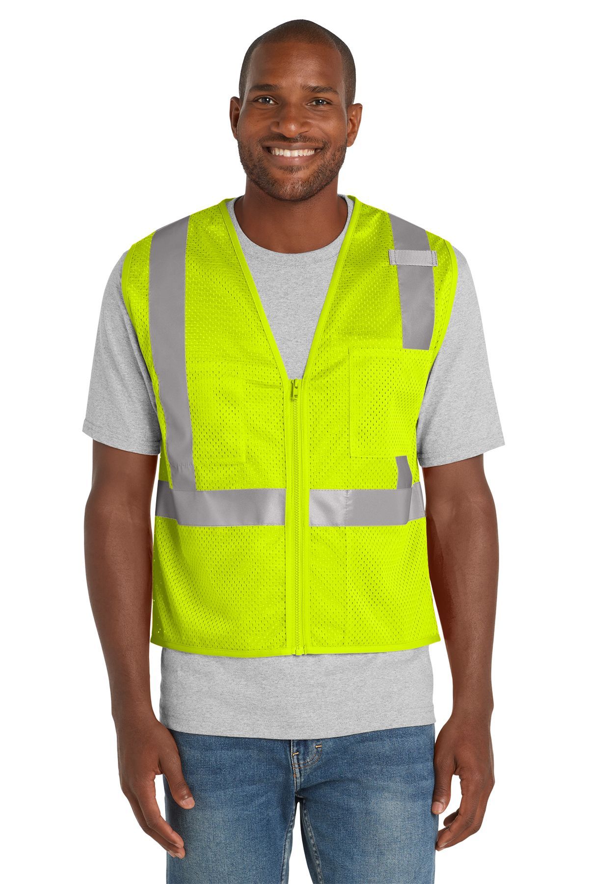 Man wearing orange reflective safety vest with gray shirt and blue jeans.