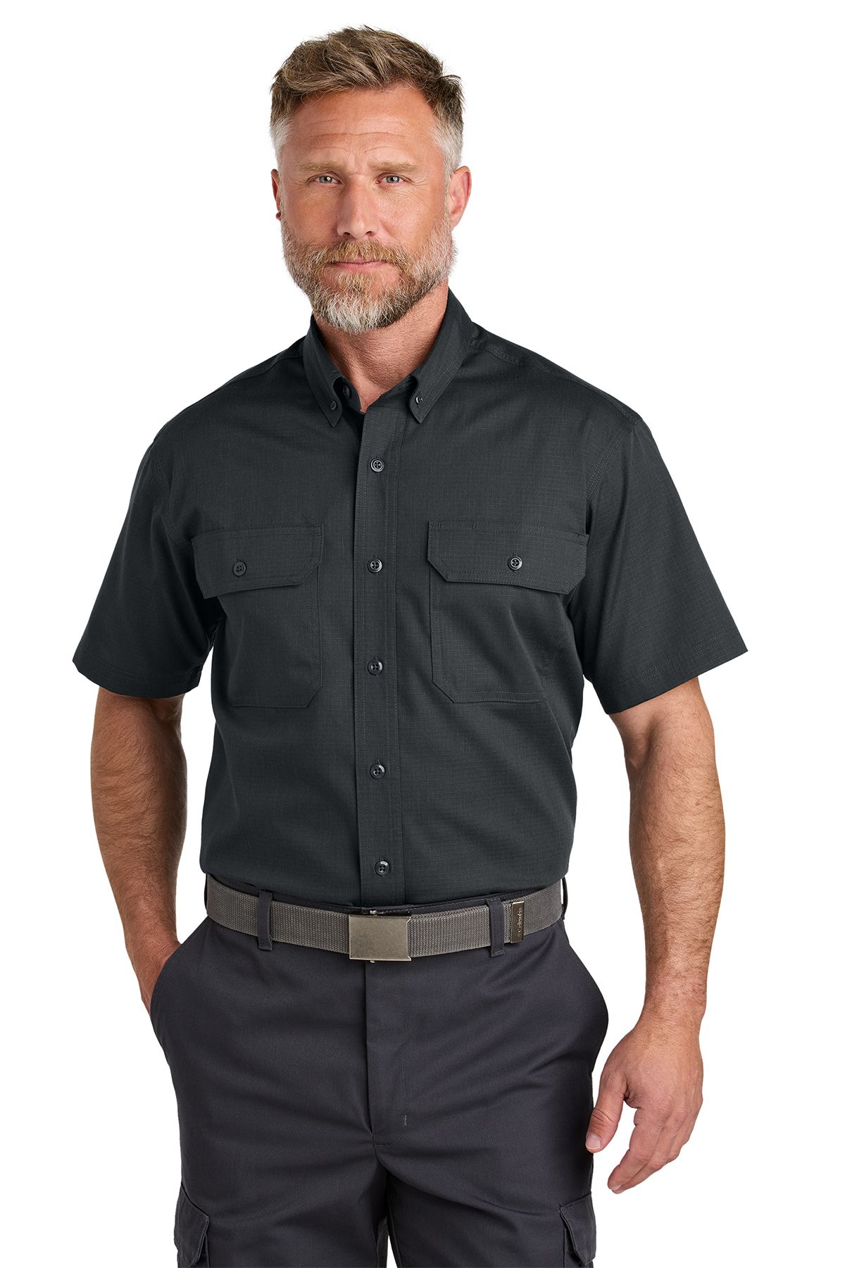 Man in black short-sleeved shirt and gray pants, buttoned-up, with a gray belt.
