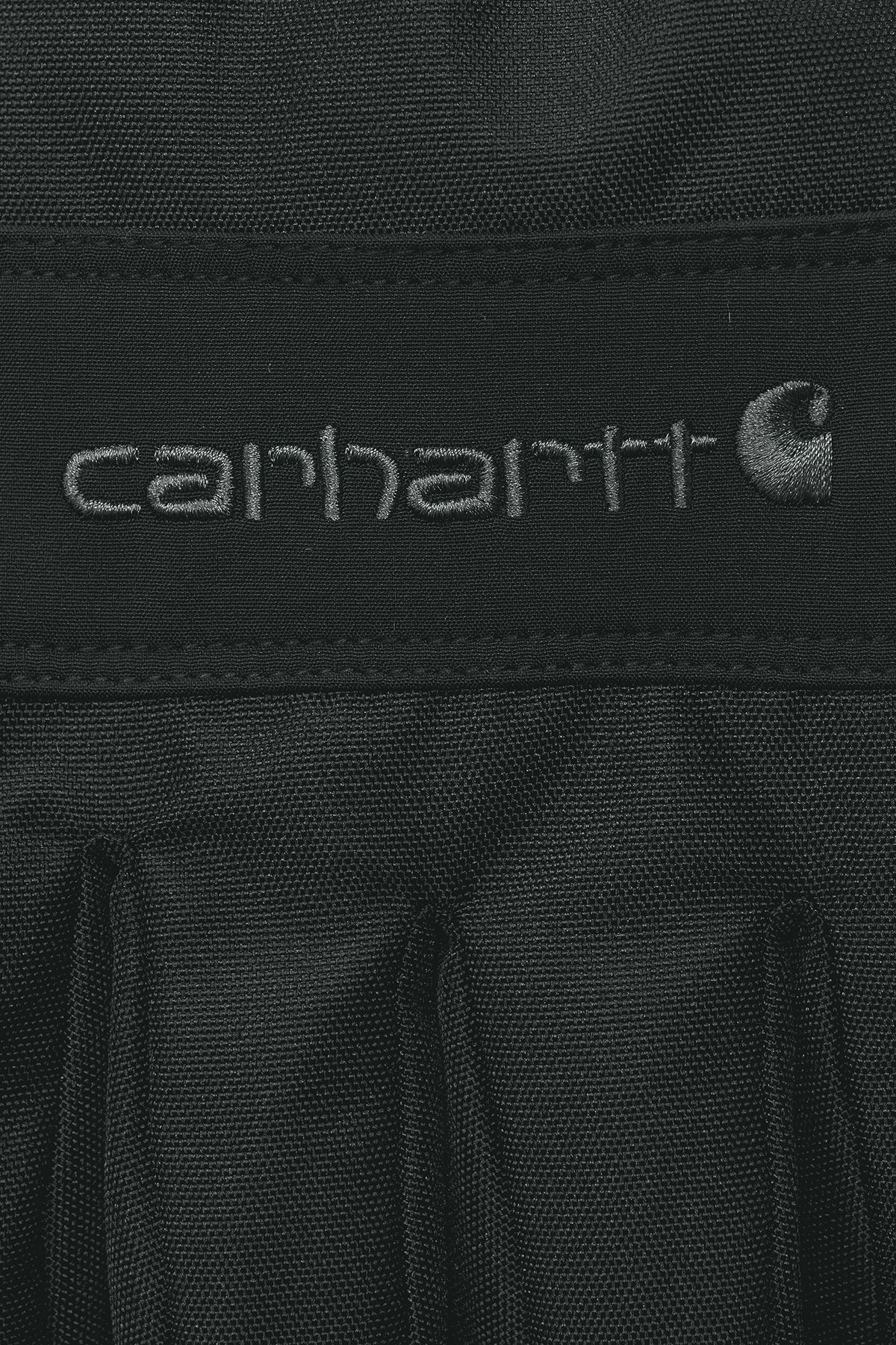 Black Carhartt winter gloves with adjustable wrist straps.