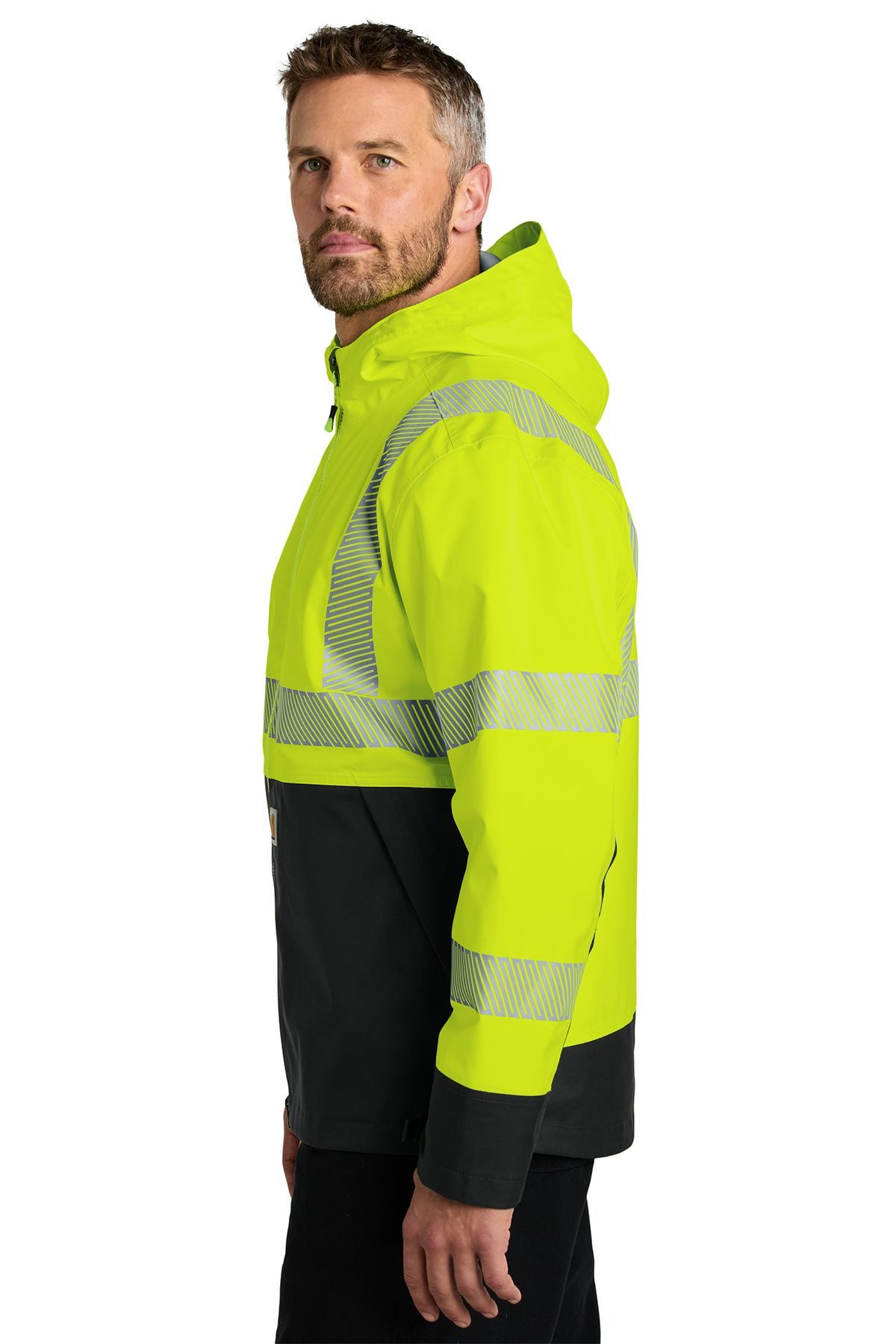 Man wearing a neon yellow and black safety jacket with reflective stripes and a hood.