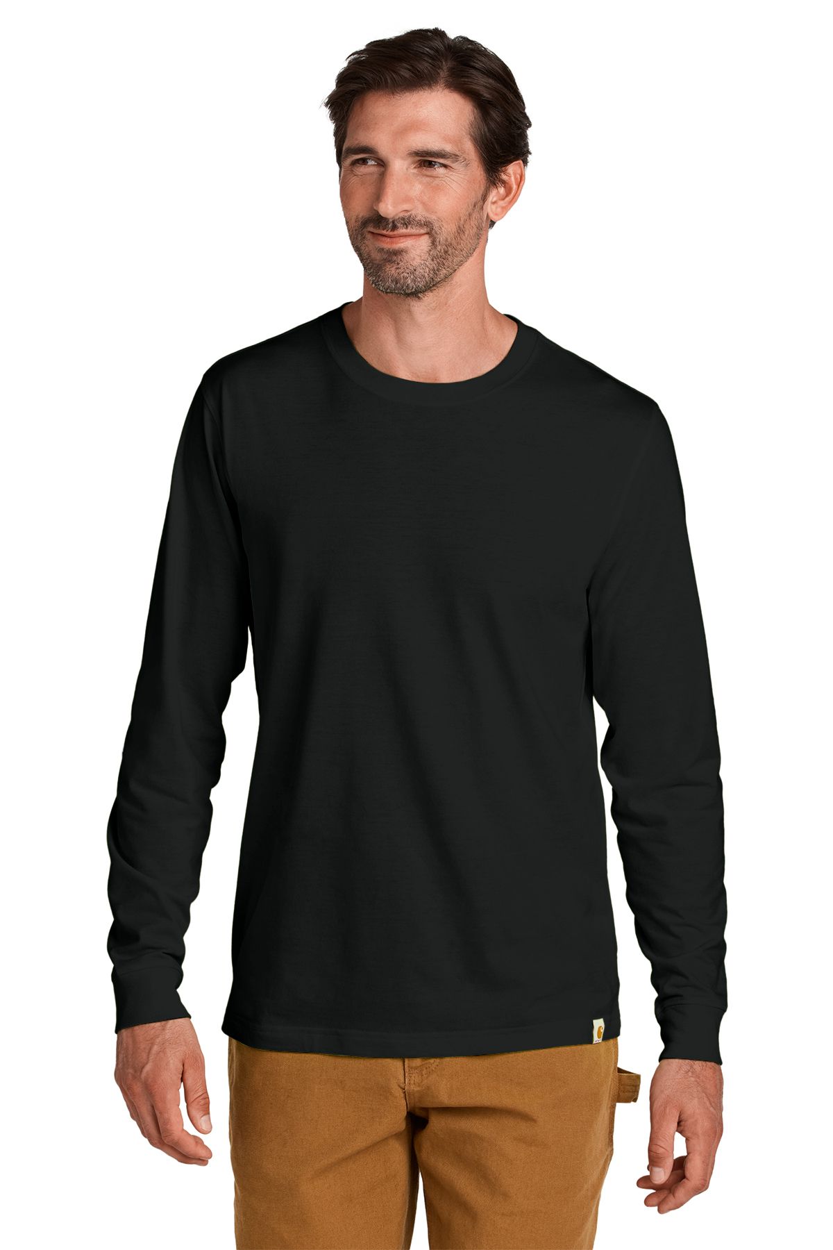 Man in black long-sleeve shirt and brown pants, looking forward.