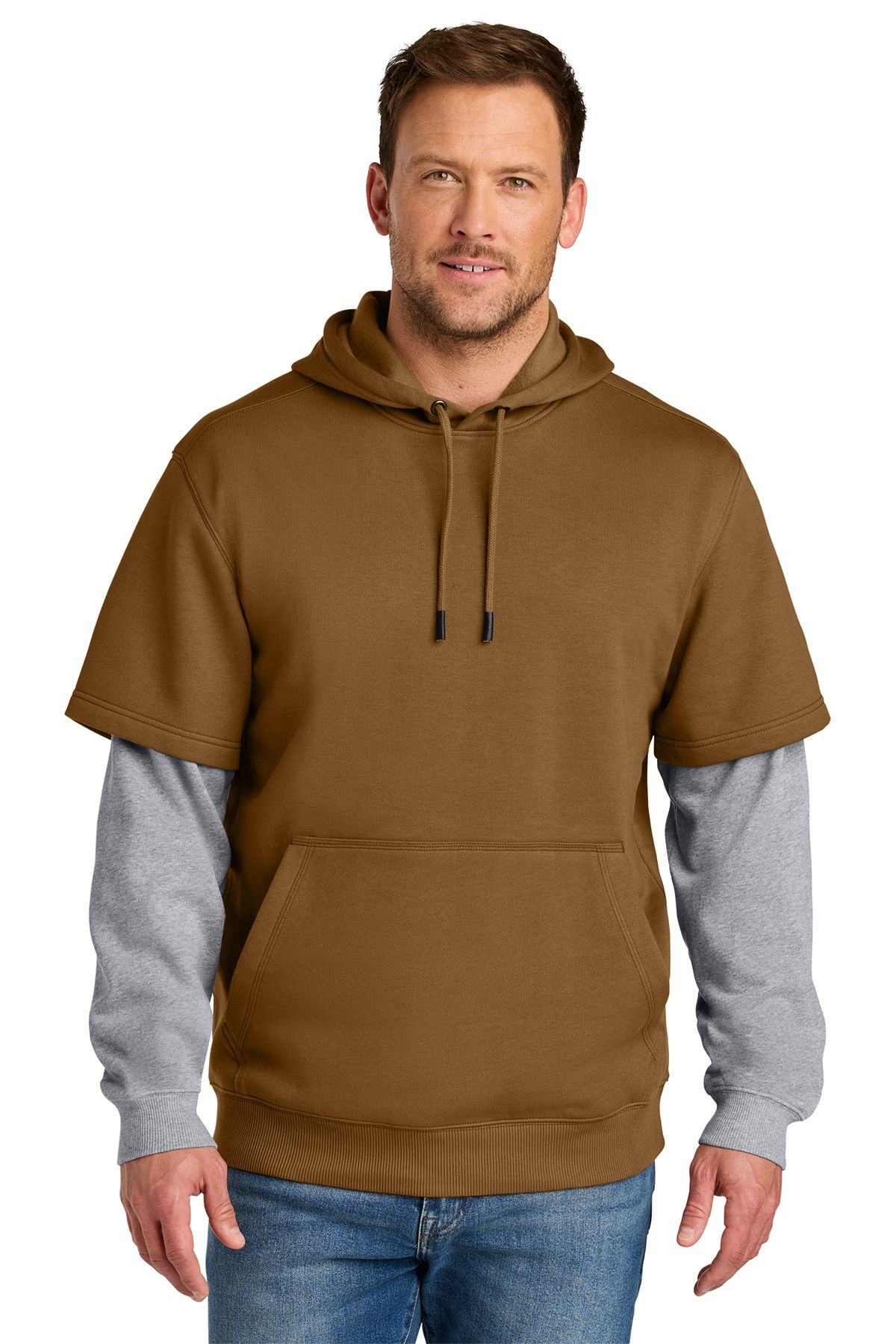 Man wearing a brown hooded sweatshirt over a gray long-sleeved shirt, standing outdoors.