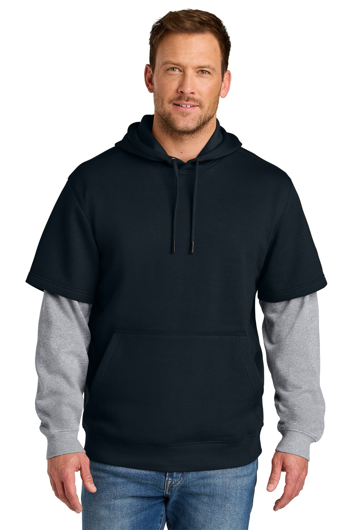 Man wearing a brown hooded sweatshirt over a gray long-sleeved shirt, standing outdoors.