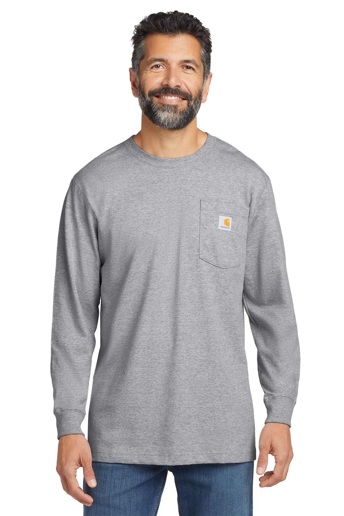 Man wearing an orange long-sleeved shirt with a pocket. He's standing in front of a white background.