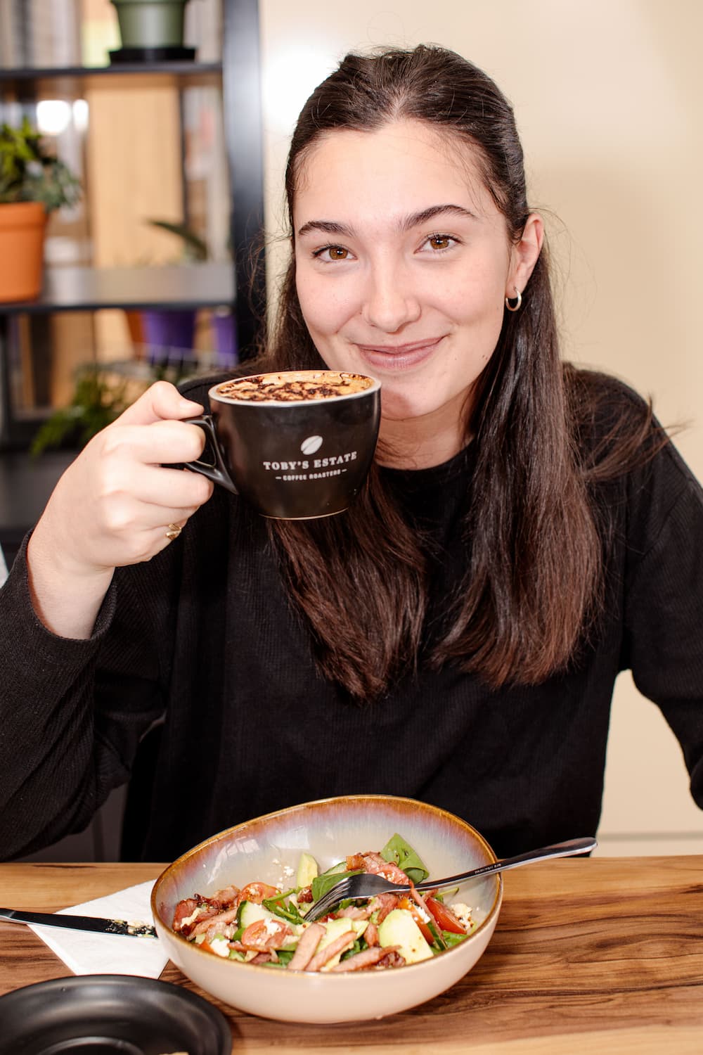 Lady Drinking Cup Of Coffee — Café & Gelato in Highfields, QLD