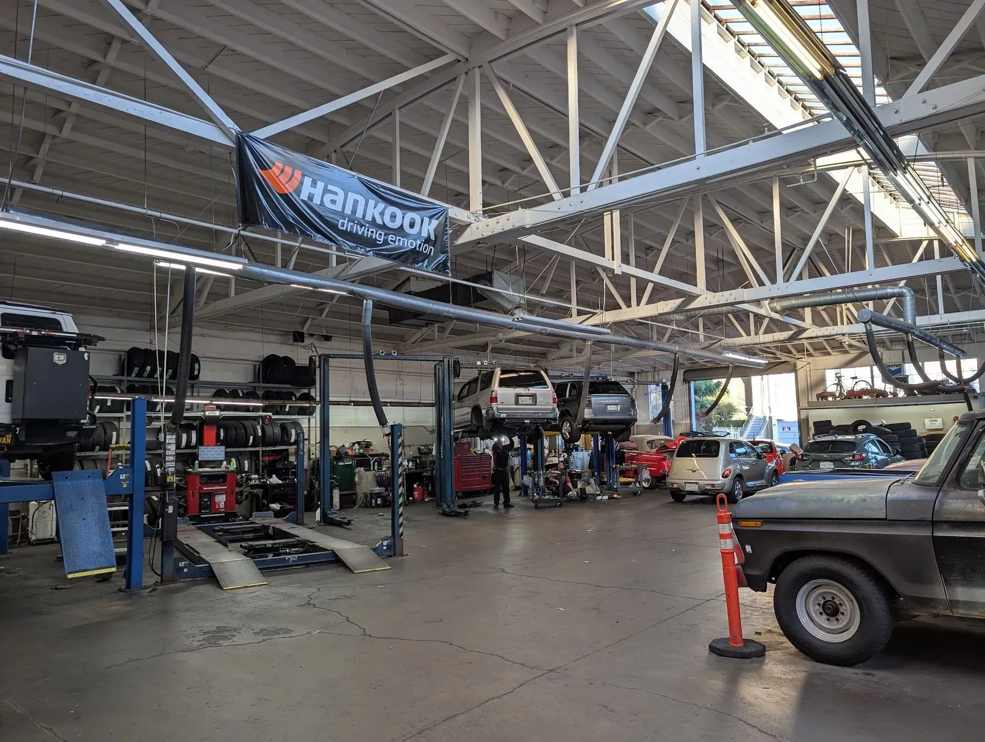 Spacious Auto Repair Shop Interior With Service Stations | Brake And Wheel Service Center LLC