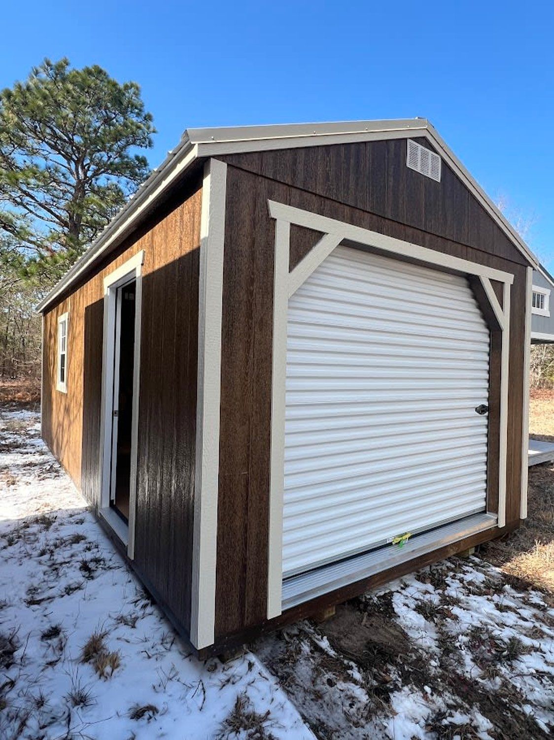 Shed with a roll up door 