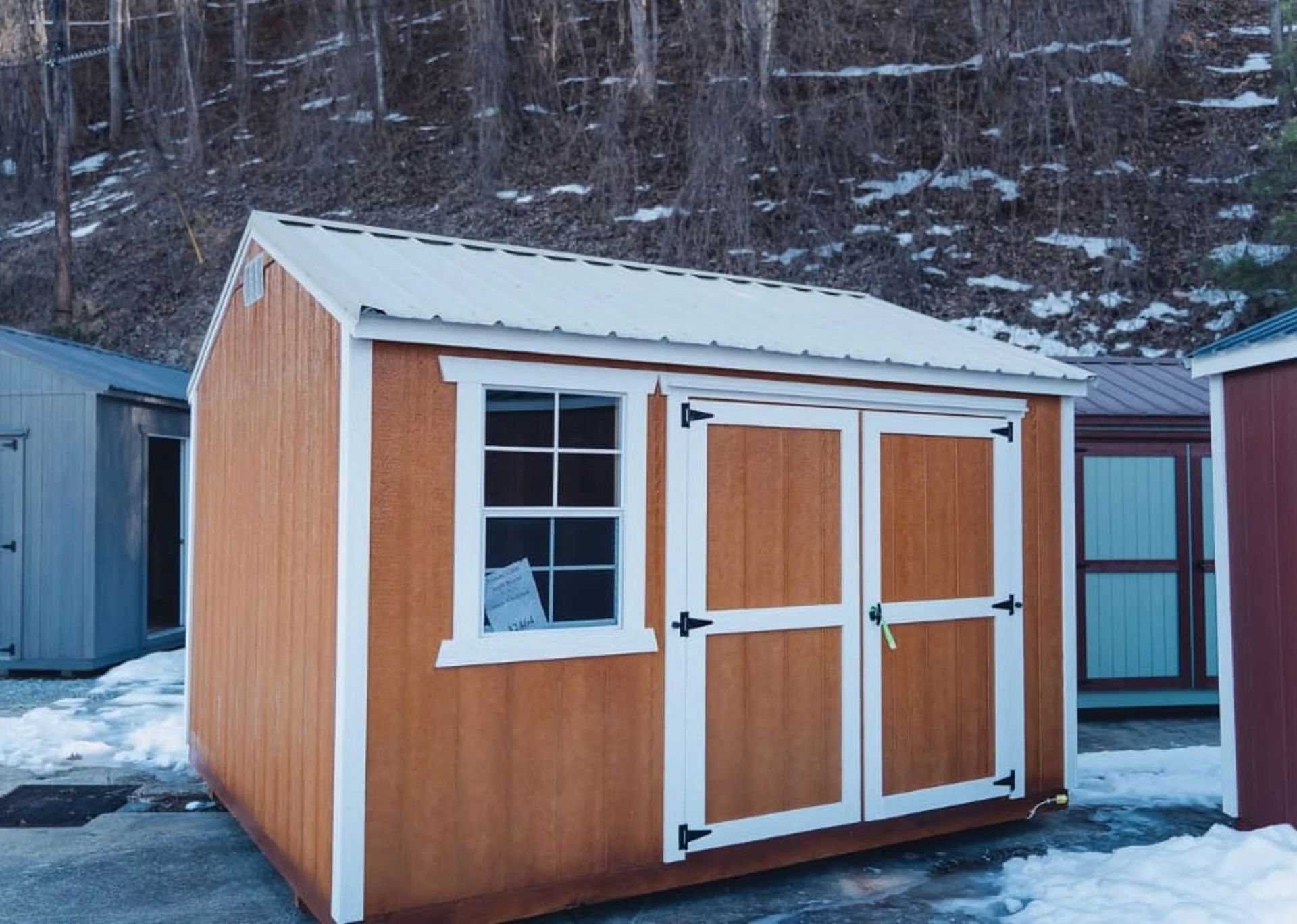 Outside the orange shed