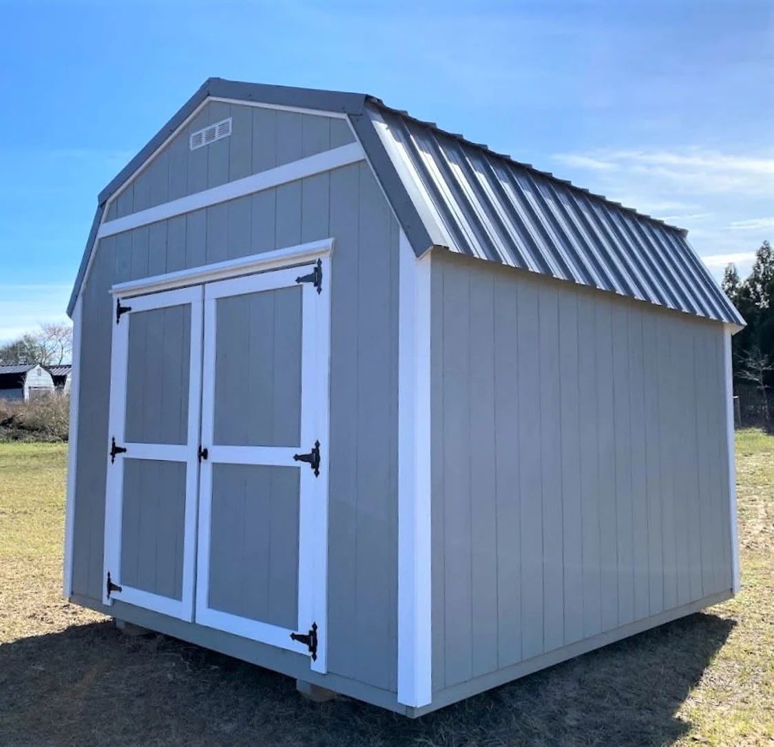 Storage shed with metal roof