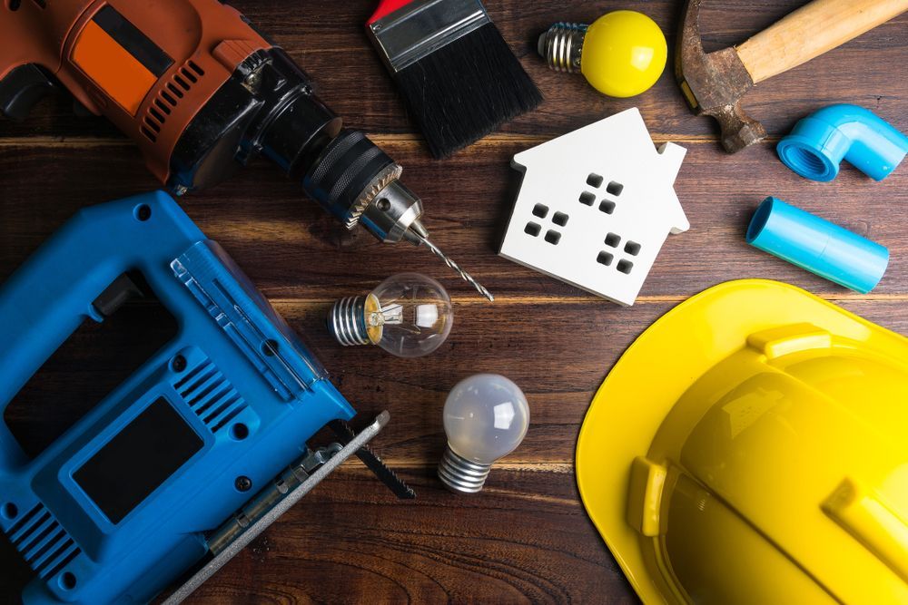 wooden white house toy and construction tools