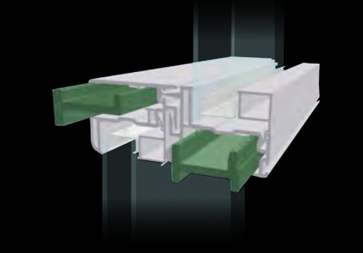 Transparent plastic connector with green clips on a black background