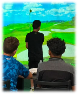 A group of young men are playing a video game of golf