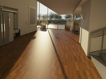 A living room with hardwood floors and a large window