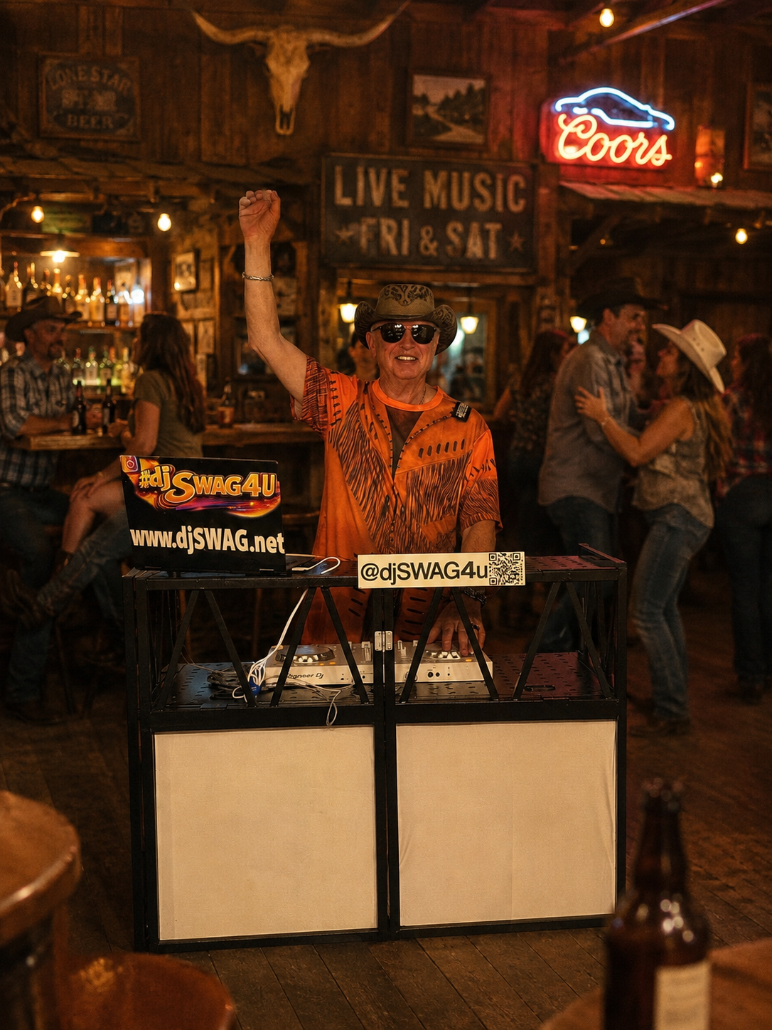 DJ in orange shirt raises a hand at a bar with live music sign and neon Coors light.