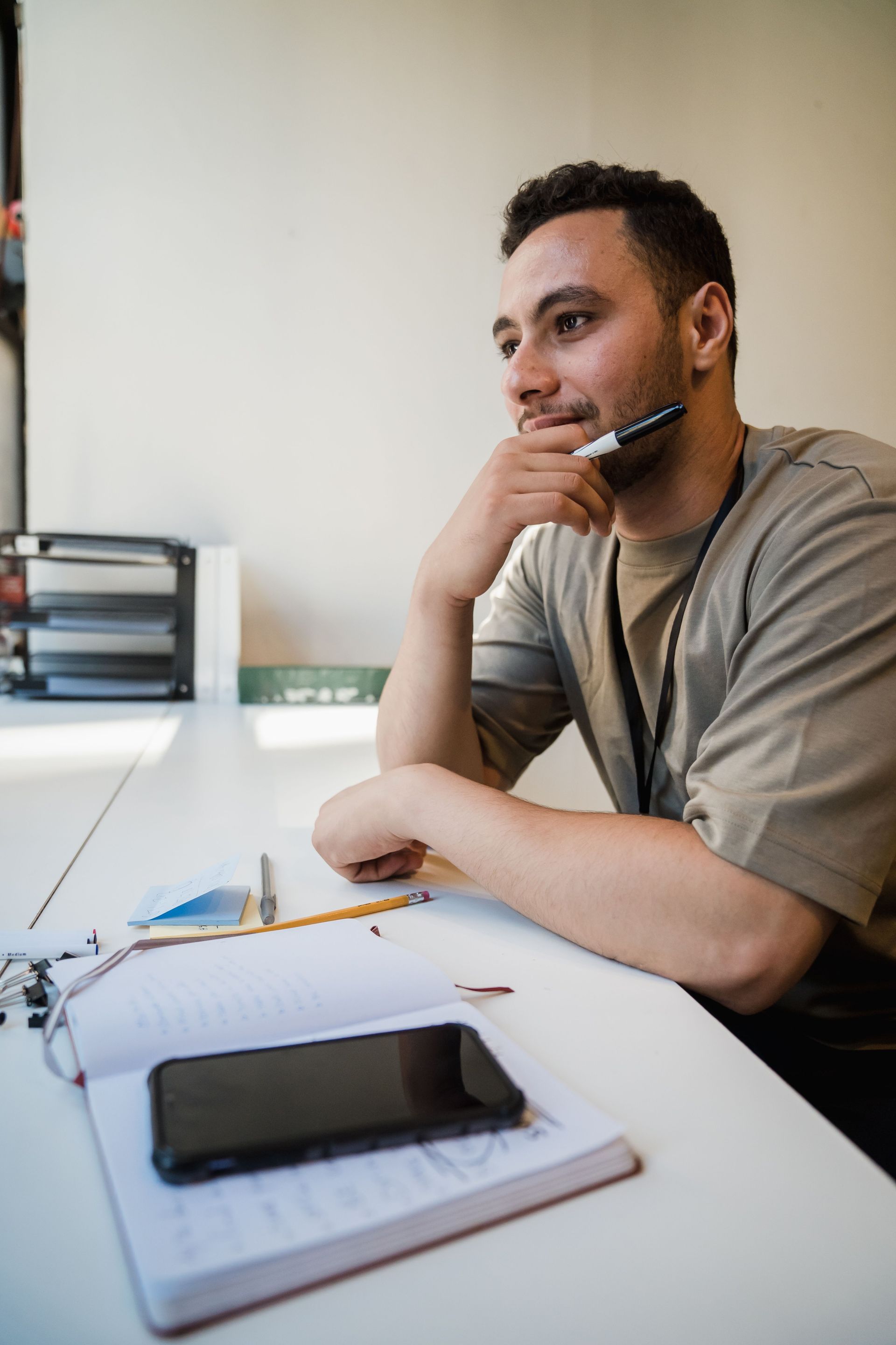 Small business owner considering HR needs for a growing team.