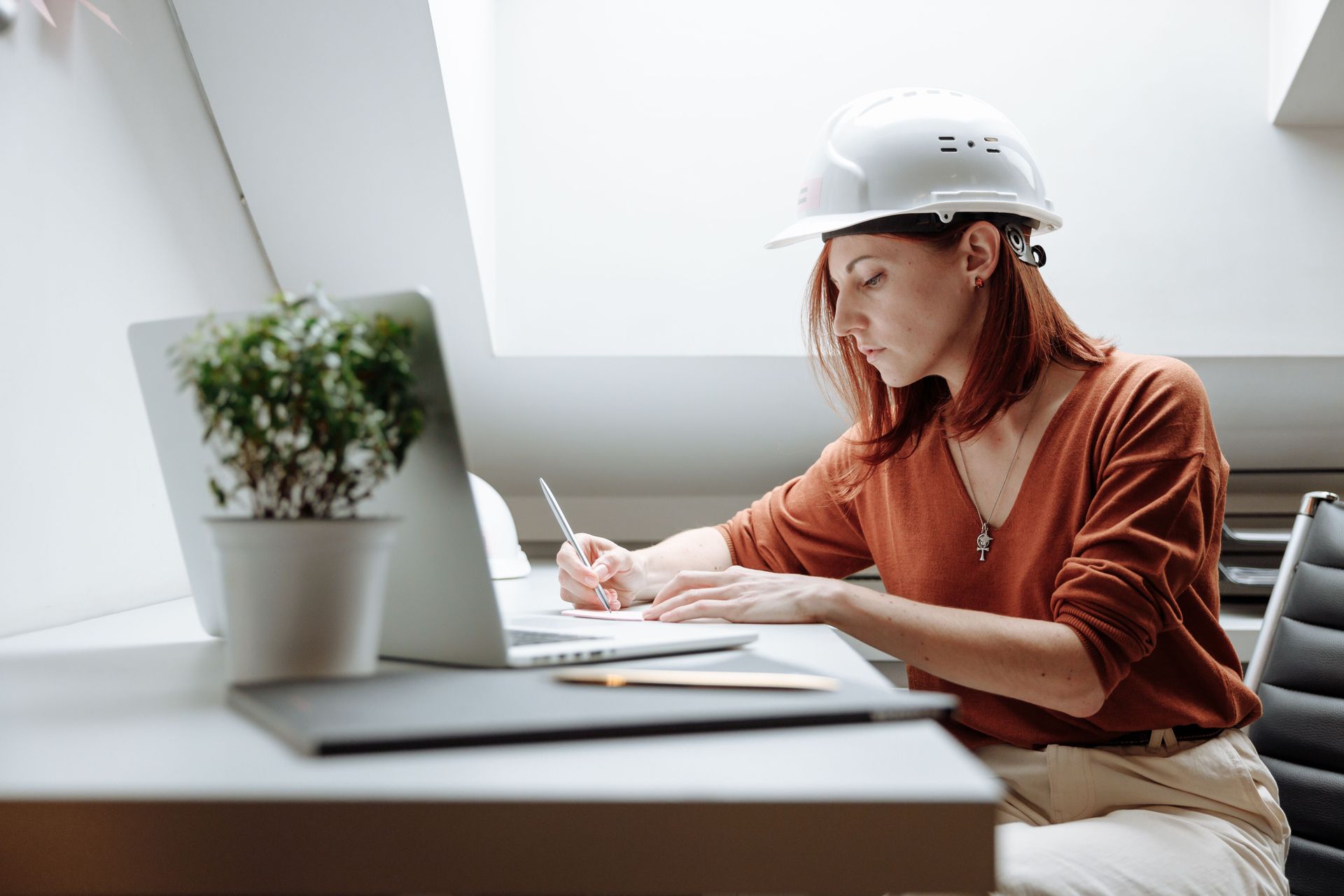 Business owner reviewing workplace practices and HR needs.