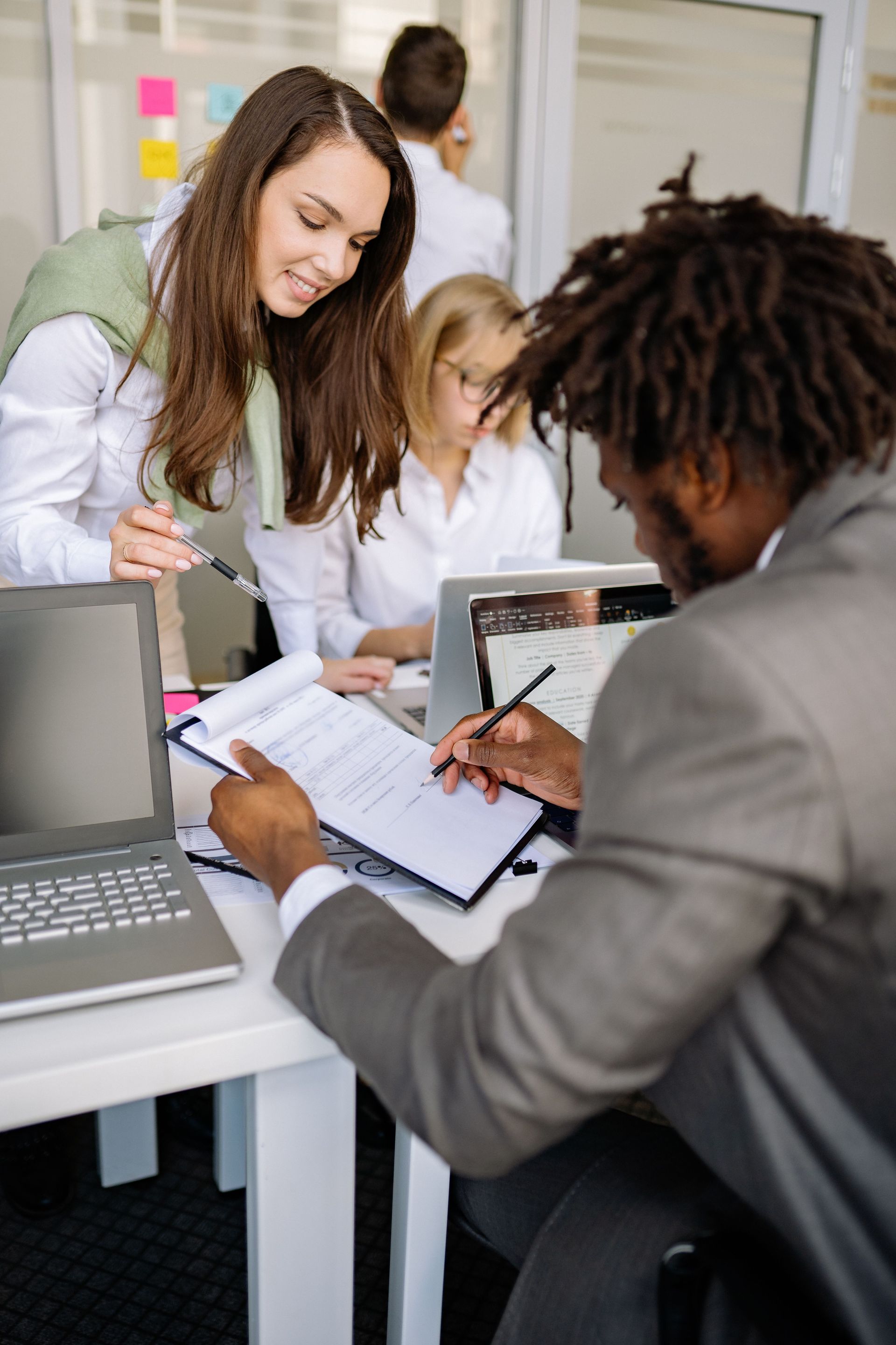 Small business team addressing an HR compliance issue.