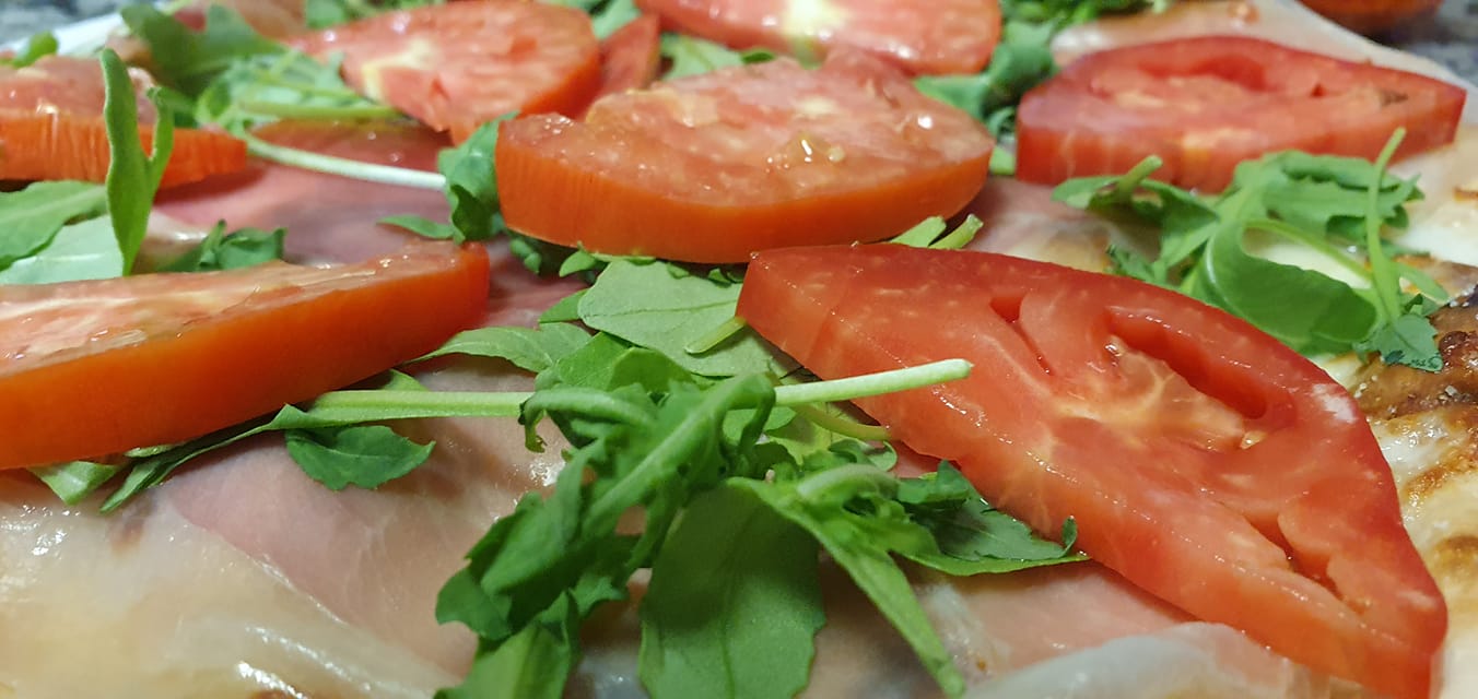 crudo and rocket pizza