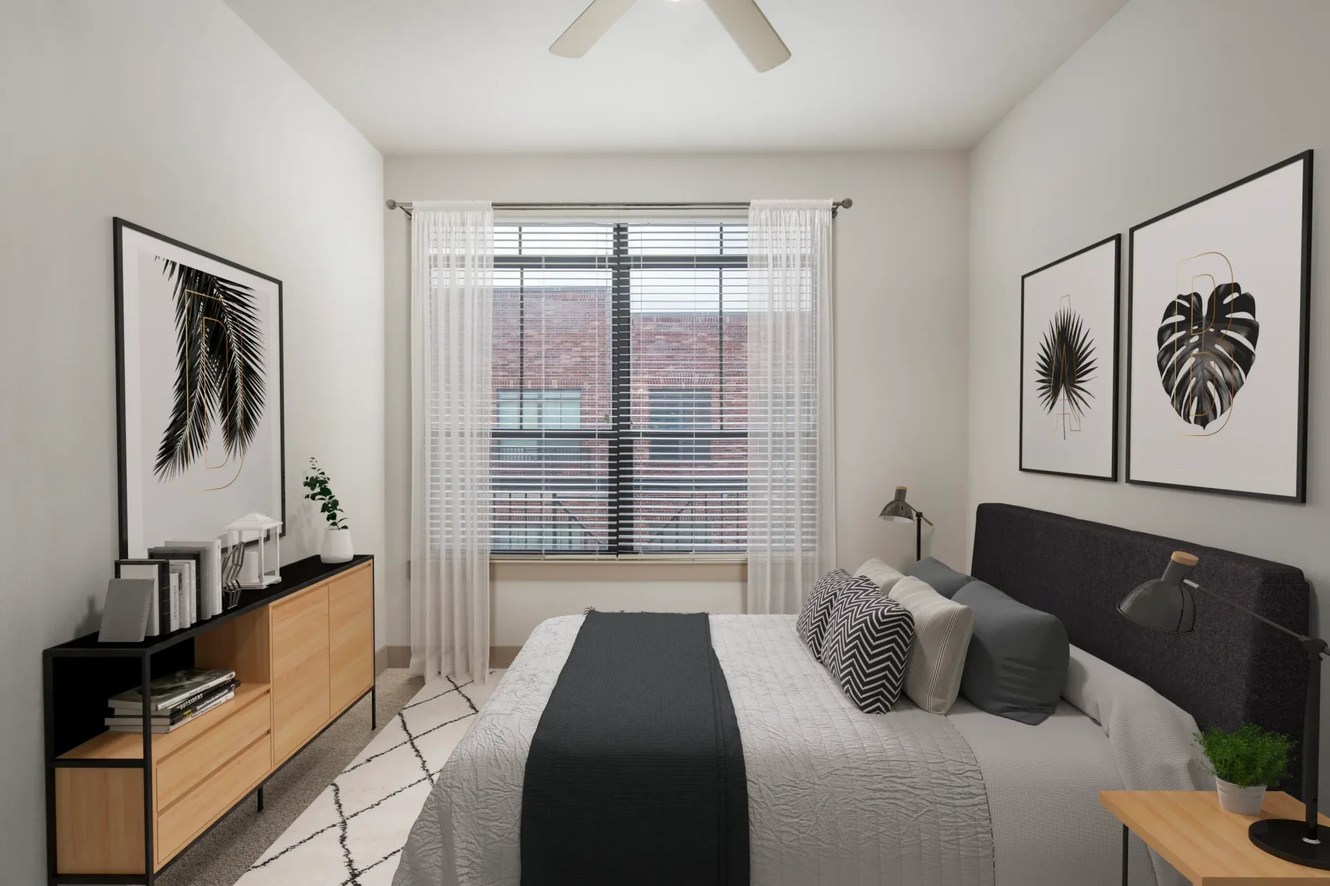 Stylish bedroom with modern decor, featuring a bed, side tables, and artwork on the walls.