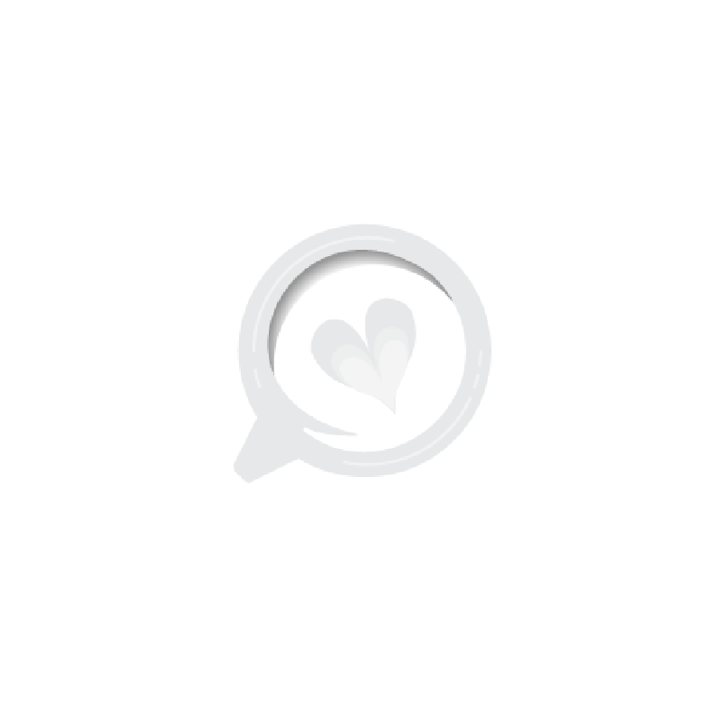 White coffee cup with heart-shaped latte art.