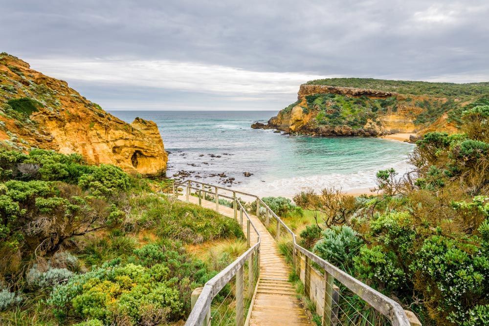 There Is A Wooden Bridge Leading To A Beach — CAL AUTO Mobile Roadworthys in Childers, QLD
