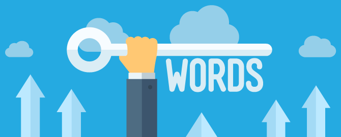 A hand is holding a key with the word words on it.