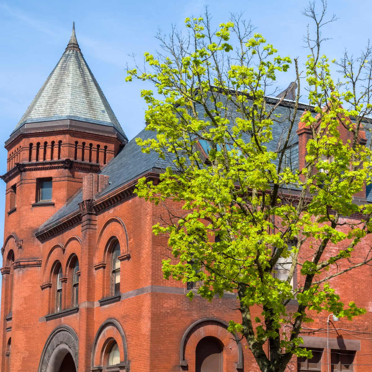 york pa A brick building with a tower and a tree in front of it
