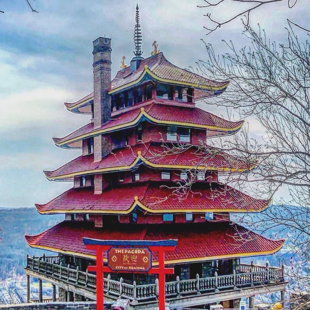 reading pa A red pagoda with a torii gate in front of it