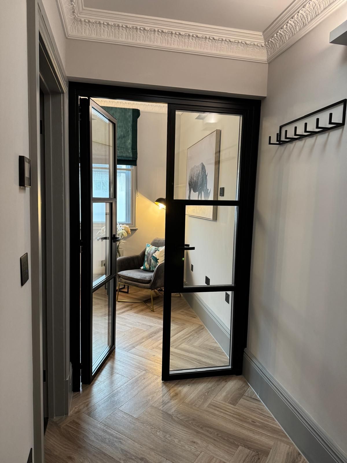 One of the new double glazed doors installed to reduce noise