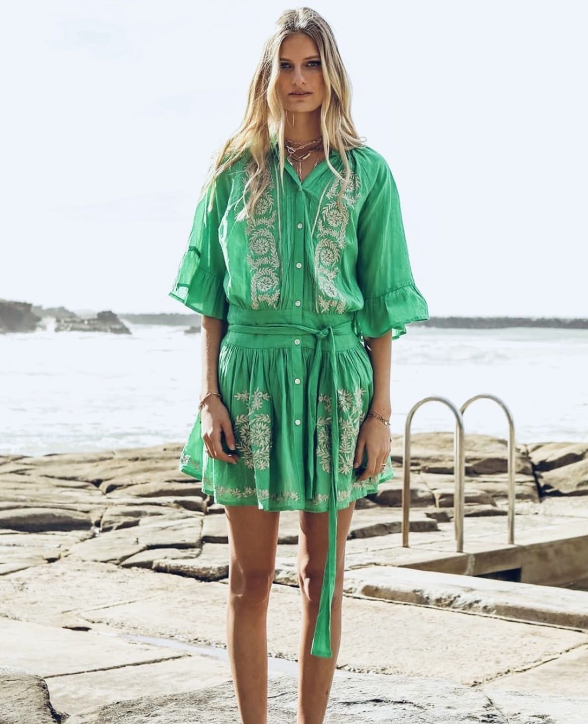 A Woman is Standing on a Beach — Onyx Poppy Boutique in Buderim, QLD
