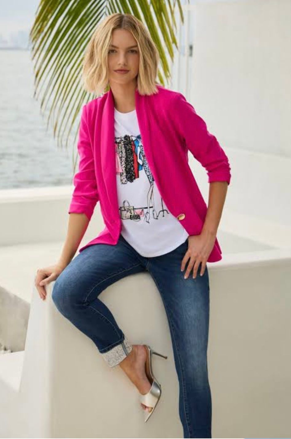 Woman in Pink Blazer, White Graphic Tee, and Jeans — Onyx Poppy Boutique in Buderim, QLD