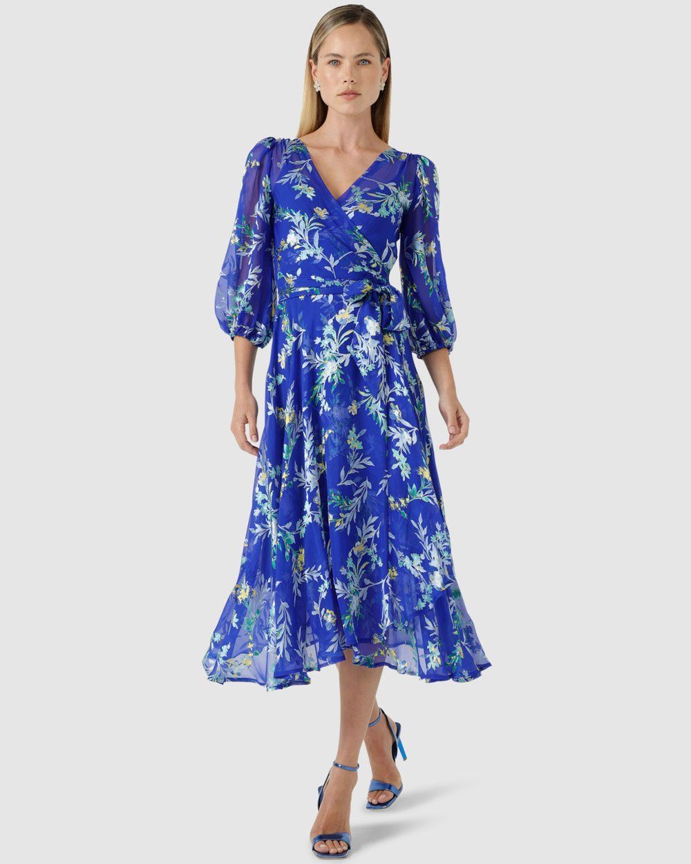 A Woman is Wearing a Mother of the Bride Dress With a Jacket — Onyx Poppy Boutique in Buderim, QLD