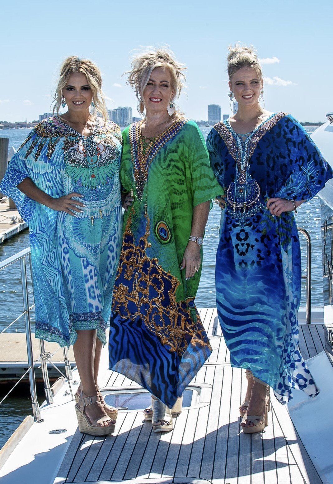Three Women Are Posing for a Picture on a Boat — Onyx Poppy Boutique in Buderim, QLD