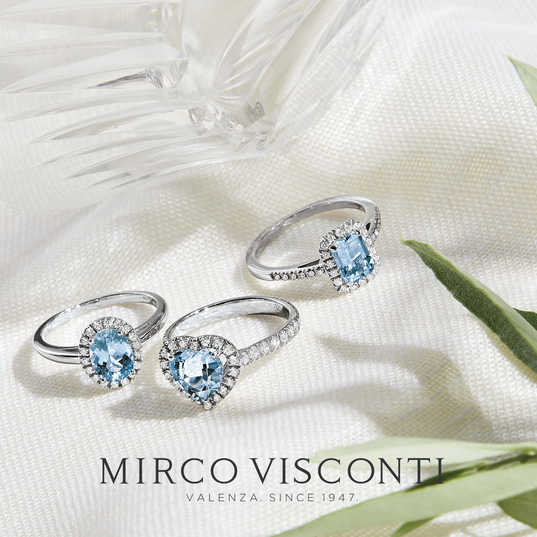 Anelli in oro 18 carati con diamanti e acque marine.