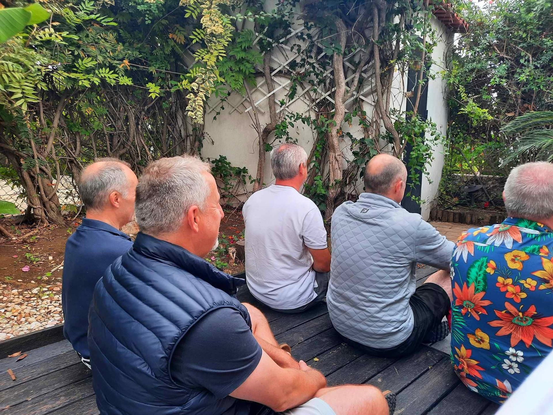 4 men meditating