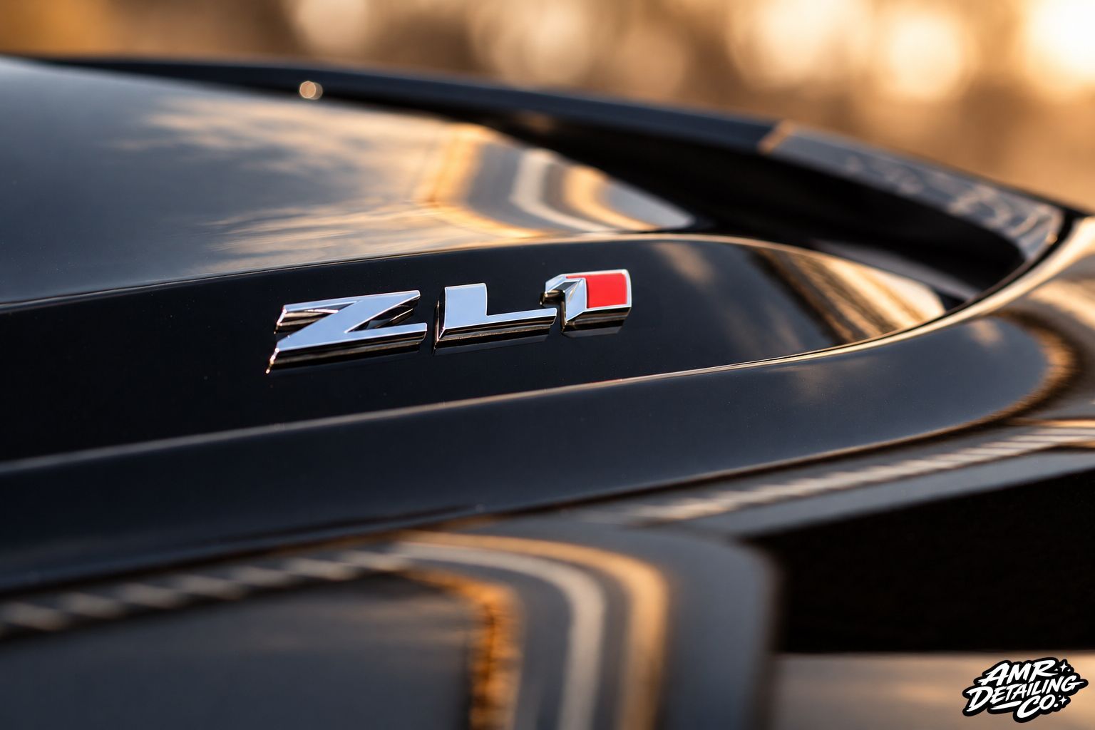 Chevrolet Camaro ZL1 badge detailed during ceramic coating service
