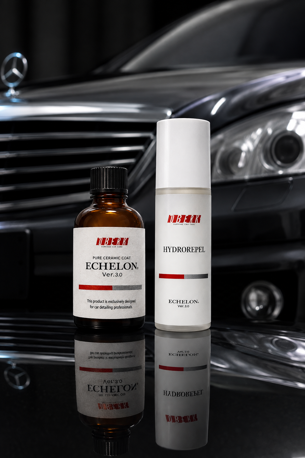 Two skincare bottles on a glossy black surface in front of a car grille and headlight.