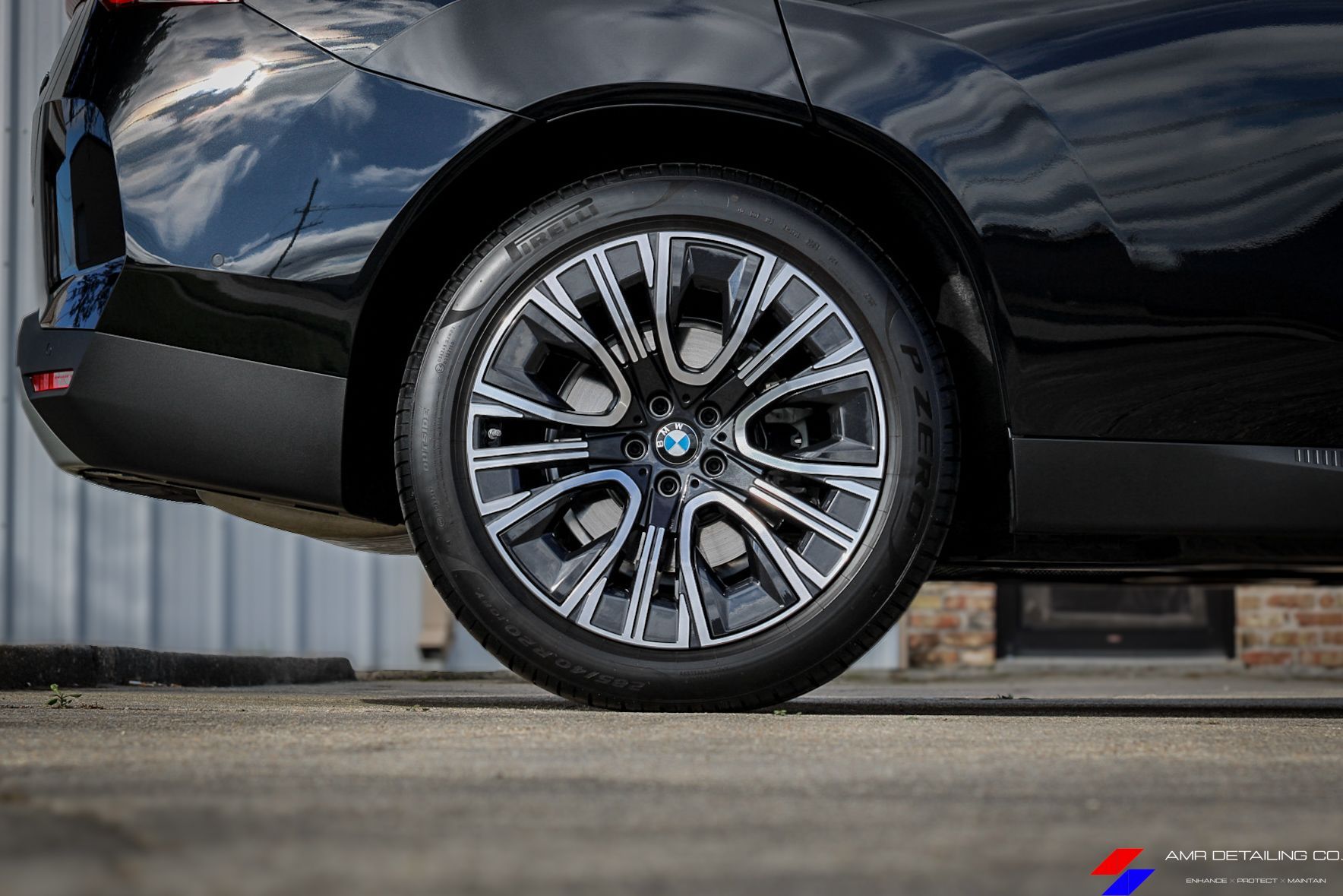 BMW X3 wheel and exterior trim after ceramic coating service
