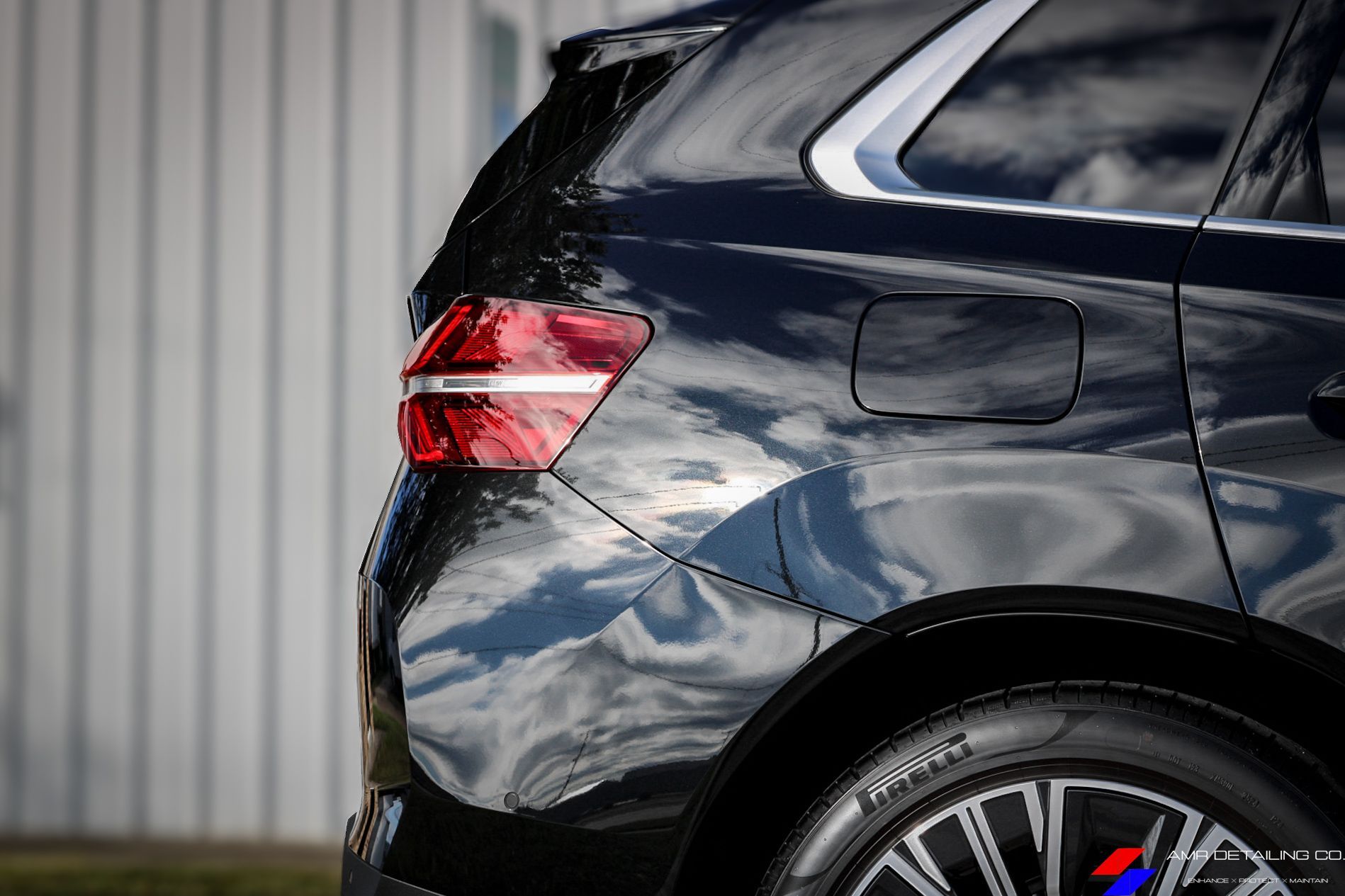 BMW X3 rear quarter showing deep paint reflections after ceramic coating

