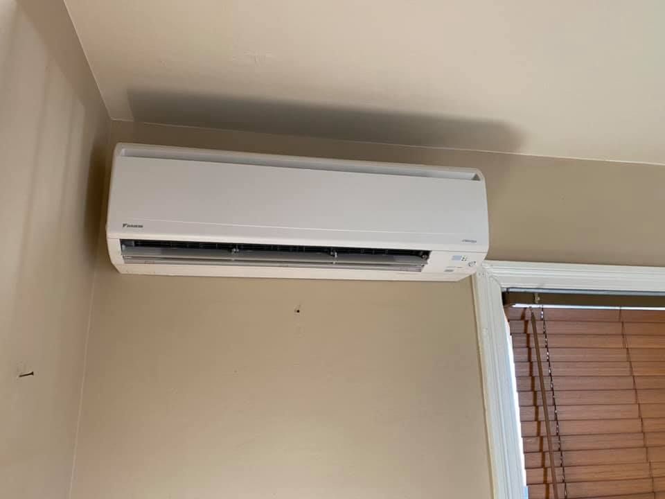 Wall-mounted Daikin mini-split system for efficient air conditioning fix and maintenance
