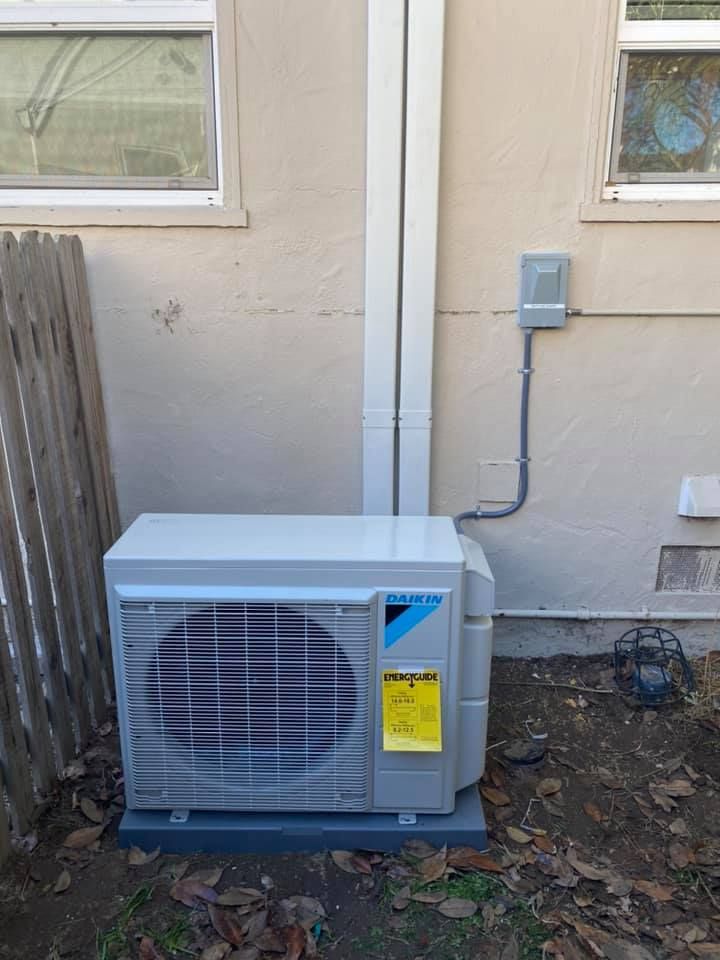 Daikin air conditioning installation with professional ductwork and HVAC service setup
